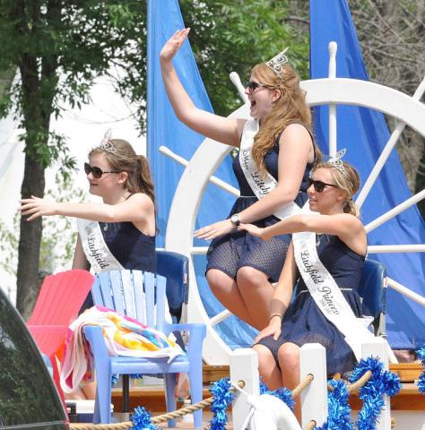 Litchfield royalty members wave to attendees of the Cosmos Space Festival parade last July. Pictured, from left to right, are princess Erika Hart, Miss Litchfield Ali Richardson and princess Emily Schreiber.