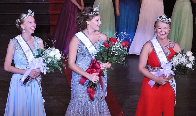 New Litchfield royalty, from left, princess Kaitlynn Beighley, queen Karly Nelson and princess Autumn Raiber, are all smiles after being crowned during the coronation Sunday.