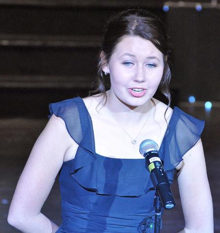 Candidate Kaitlyn Lundin introduces herself to the crowd at the coronation. Lundin earned the formal gown award at coronation.