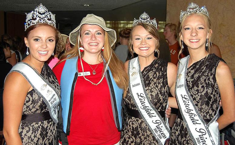 Miss Litchfield Karly Nelson, left, stands next to last year’s queen, Ali Richardson, at a Meet The Candidates event in July during the Minneapolis Aquatennial. Joining them are princesses Autumn Raiber, third from left, and Kaitlynn Beighley.