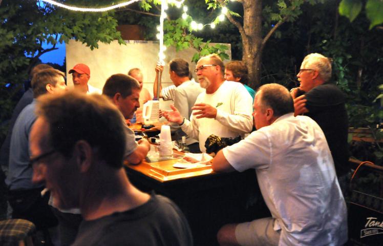 The Tanks use a home on North Sibley Avenue for their headquarters, which features a portable bar in the backyard.