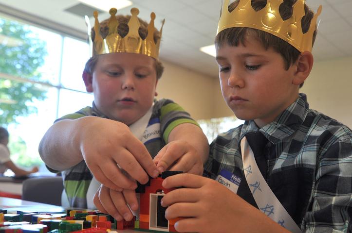 Princes Quintin Berube and Gavin Terning work together to build a Lego house.