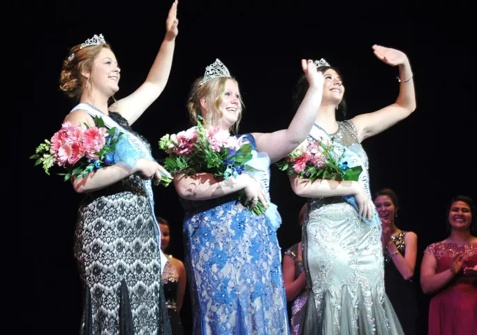 For the first time during their reign, Watercade Princess Michelle Oster, Miss Litchfield Hailey Stoffer and Princess Justine Madsen waved to the crowd during Sunday night’s coronation.