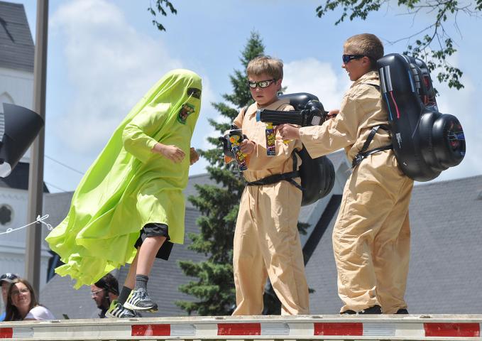Sean Barnes, 10, Nathan Wuotila, 11, and Kaiden Voss, 12, team up at Saturday’s lip sync contest and perform the “Ghostbusters” theme song.