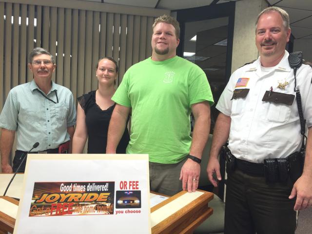 Meeker County Toward Zero Deaths Safe Roads Coalition members Ron Mortensen, Catherine Birr, Jesse Hudec and Meeker County Sheriff Brian Cruze piloted the JOYRIDE program in Meeker County in 2015.  File photo