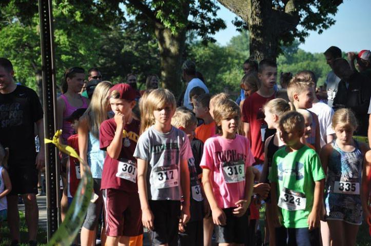 Kids lined up for the Watercade Lake Ripley one-mile Fun Run last July.