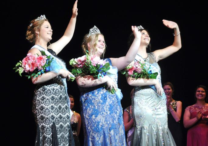 For the first time during their reign, Watercade Princess Michelle Oster, Miss Litchfield Hailey Stoffer and Princess Justine Madsen waved to the crowd during Sunday night’s coronation.