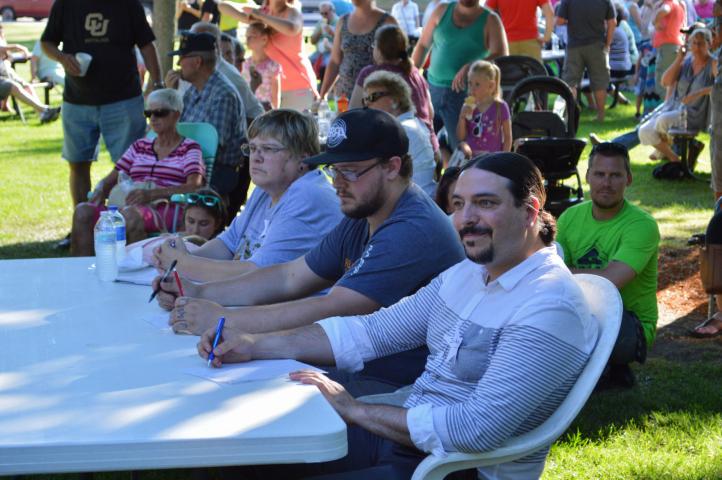 Darlene Kotelnicki, JT Cook and Tim Cook judged performers at Watercade Idol in Central Park July 6.