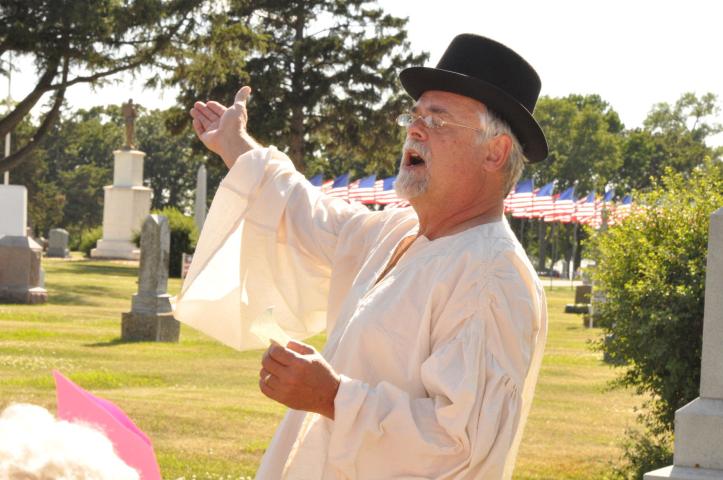 Clark Gustafson portrayed a W.B. Butterfield during a tour of Lake Ripley Cemetery July 7.