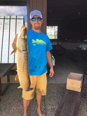 Chase Piepenburg of Litchfield poses with his first prize winning northern pike weighing in at seven pounds, 13 ounces at the Watercade fishing contest.  Courtesy of Lyle Diekmann