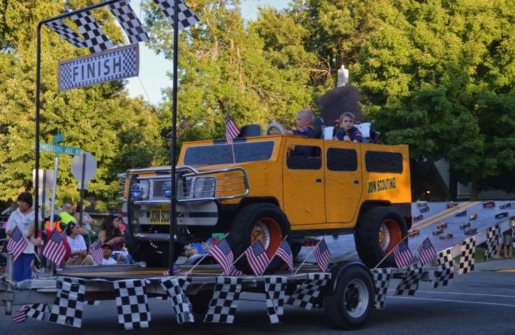 Litchfield Cub Scouts Pack 353 drove in style with an large-scale model of a yellow hummer in the Grand Day Parade.