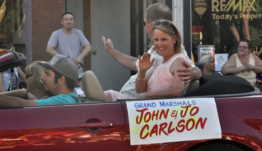 Longtime teachers and coaches John and Jo Carlson were Grand Marshals in the Grand Day Parade Saturday evening.