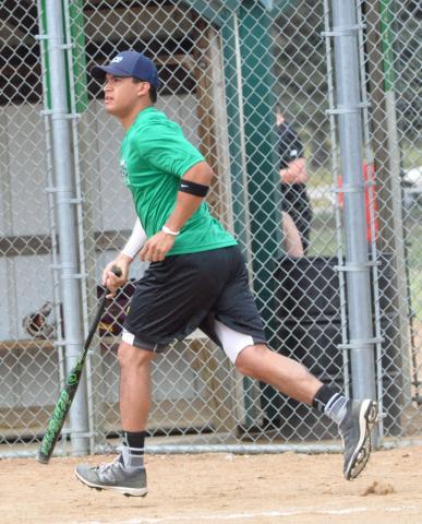 Eddie Estrada traded his usual baseball bat for a softball bat to compete for the Litchfield Wave Armor team in the Watercade softball tournament.