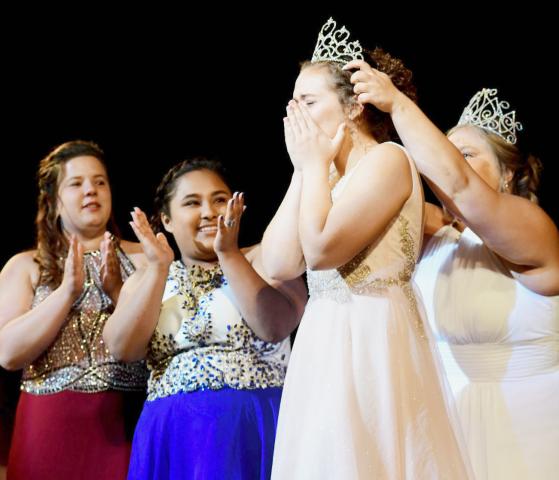 From left, Miss Litchfield candidates Amelia Bomkamp and Litzy Rodriguez clap as Miss Litchfield 2019 Cecelia Toenjes is crowned by outgoing Miss Litchfield Brianna Larson.
