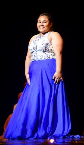 Litzy Rodriguez wears a blue and white evening dress to the Miss Litchfield coronation event. She won the evening wear category at the Miss Litchfield Coronation event.