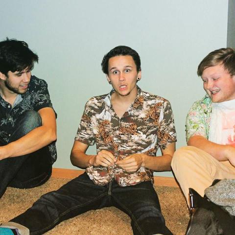 From left, guitarist Aaron Hernandez, lead vocalist Alec John Maerten and bassist Jacob Ross hang out during band practice.