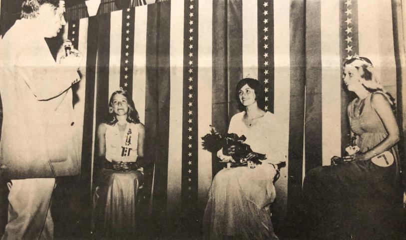 New Royalty — Litchfield’s 1977 Watercade royalty were pictured on stage with Commodore Bob Weida as the Watercade queen pageant concluded Sunday night. Lori Goemer, left, and Ann Hulterstrum, right, were named as Watercade princesses while Janelle Urdahl, center, was the new queen.