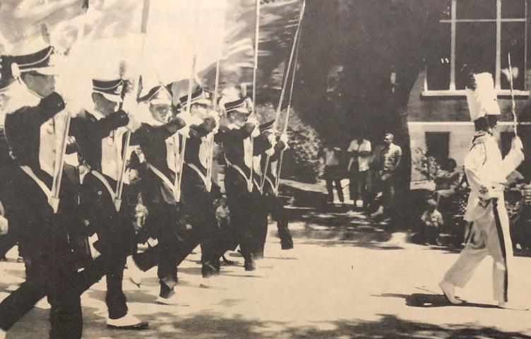 Colorguard, Major Don Fitter, lead LHS Marching Band. Dragon Band voted as “Best” in annual Watercade parade in 1966.