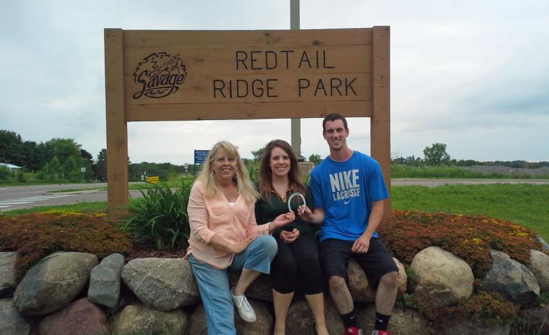 Julie Meyers, Kaitlyn Meyers and Brendon Ranagan pose with the 2015 horseshoe, which they found at Redtail Ridge Park.  SUBMITTED PHOTO