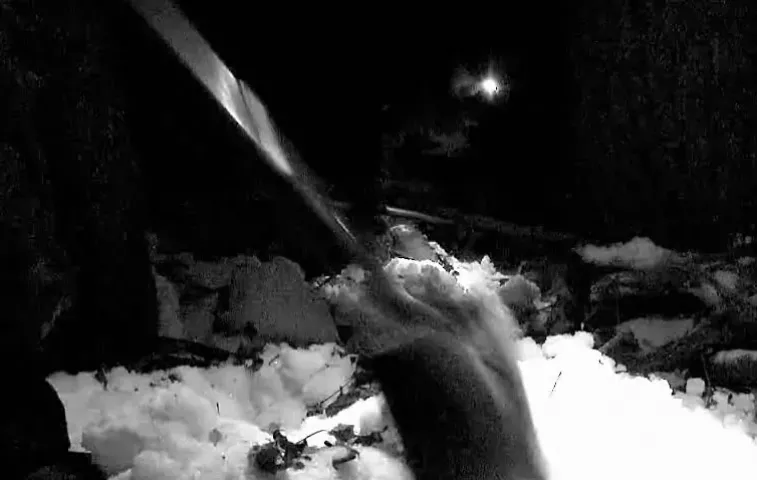 A shovel in a snow bank