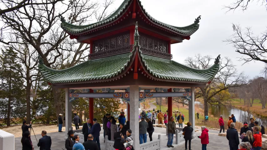 Visitors sipped hot tea and listened to a performer play the Qeej, a reed instrument, as they got their first look at the new Xiang Jiang Pavilion in Phalen Regional Park on Saturday, Nov. 3, 2018. The pavilion is a gift from St. Paul's sister city Changsha in China and the first phase of a 1.2 acre China garden called the St. Paul-Changsha China Friendship Garden of Whispering Willows and Flowing Waters. (Deanna Weniger / Pioneer Press)