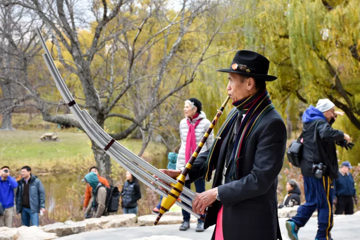 A performer plays the Qeej, a free-reed musical instrument with a hollow body and six bamboo pipes, Saturday, Nov. 3, at the unveiling of the new Xiang Jiang Pavilion, a gift from St. Paul's sister city Changsha in China. The pavilion is the first phase of a 1.2 acre China garden in Phalen Regional Park. (Deanna Weniger / Pioneer Press)