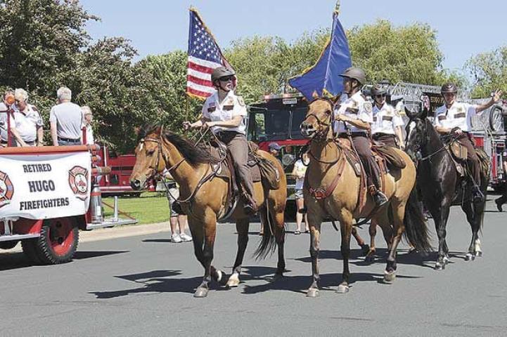 Members of the Washington County Sheriff’s Department ride on horseback during the grand parade.