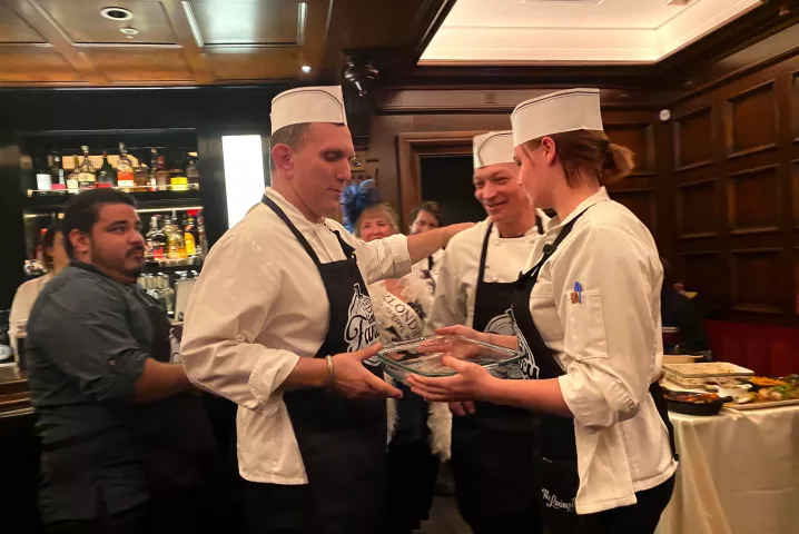 The Lexington Chef Jack Riebel and his team celebrate their People's Choice win at the 2020 Winter Carnival Fancy Hotdish Competition. The third annual competition was held at The Lexington in St. Paul on Jan. 19, 2020. (Nancy Ngo / Pioneer Press)