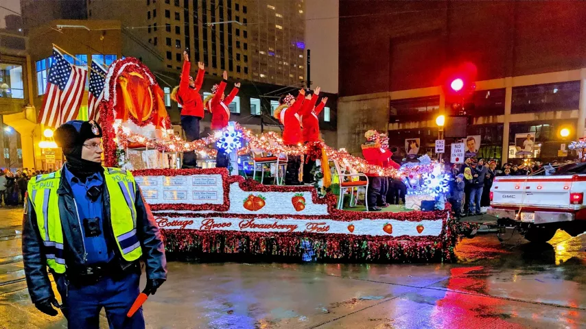 Royalty from the Cottage Grove Strawberry Fest greet the crowds at the St. Paul Winter Carnival's Vulcan Victory Torchlight Parade on Saturday, Feb. 2, 2019. (Julio Ojeda-Zapata / Pioneer Press)
