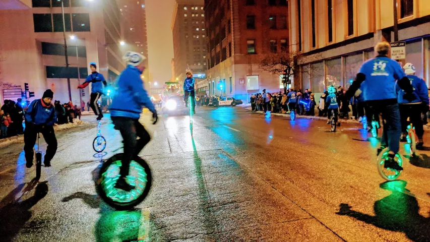 Unicyclers strut their stuff at the St. Paul Winter Carnival's Vulcan Victory Torchlight Parade on Saturday, Feb. 2, 2019. (Julio Ojeda-Zapata / Pioneer Press)