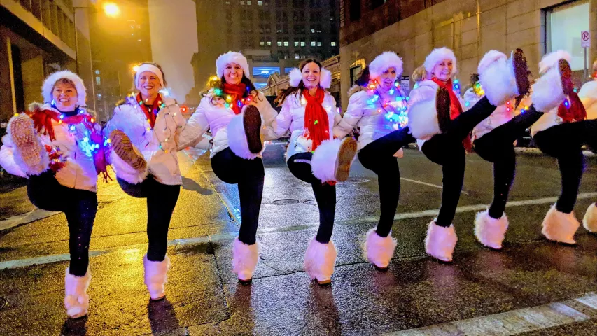 Dancers kick high at the St. Paul Winter Carnival's Vulcan Victory Torchlight Parade on Saturday, Feb. 2, 2019. (Julio Ojeda-Zapata / Pioneer Press)