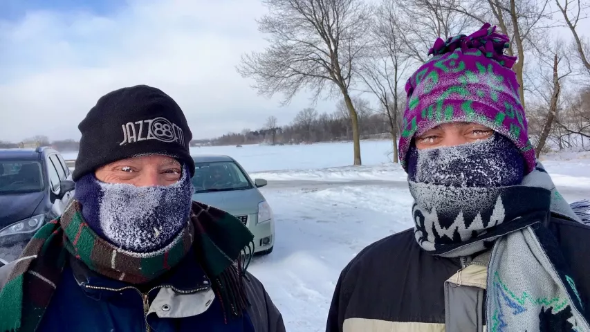 Pioneer Press Treasure Hunters Dave Anderson, left, of Arden Hills, and his son Ryan Anderson of Roseville stand on the windswept southern edge of Long Lake, ready to head home on Tuesday, Jan. 29, 2019, at Long Lake Regional Park in New Brighton. (Lisa Legge / Pioneer Press)