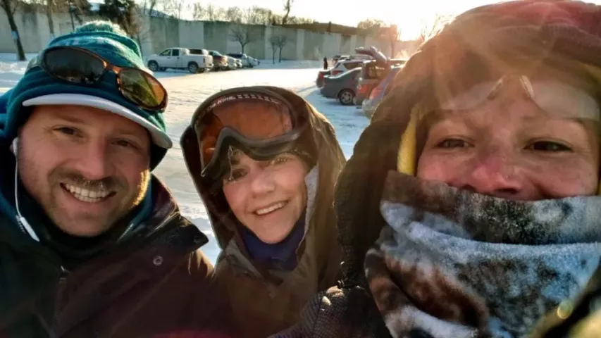 Jason Stride, left, of Portland, Oregon, with Treasure Hunt friends Kelli Kamholz, center, and Alicia Kamholz Mertz during the 2019 medallion search at Long Lake Regional Park in New Brighton. (Courtesy of Jason Stride)