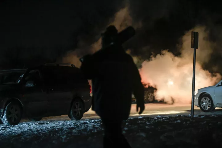 Treasure hunters leave their warm cars and head into the woods to work late into the night in temps -22 Fahrenheit as they scour the park in search of the medallion, Wednesday, January 30, 2019. (Special to the Pioneer Press: Craig Lassig)