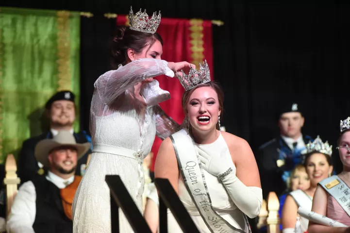 Alison Gunter, right, is crowned the 2019 Aurora, Queen of Snows by Jilla Nadimi, the 2018 queen, during the Winter Carnival Royal Coronation events at Saint Paul RiverCentre, Jan. 25, 2019. Gunter represents Hamernick's Interior Solutions of St. Paul. The Royal Coronation is a 130+ year old Winter Carnival tradition. (Scott Takushi / Pioneer Press)