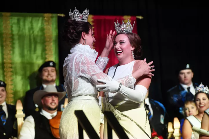 Alison Gunter, right, is crowned the 2019 Aurora, Queen of Snows by Jilla Nadimi, the 2018 queen, during the Winter Carnival Royal Coronation events at Saint Paul RiverCentre, Jan. 25, 2019. Gunter represents Hamernick's Interior Solutions of St. Paul. The Royal Coronation is a 130+ year old Winter Carnival tradition. (Scott Takushi / Pioneer Press)