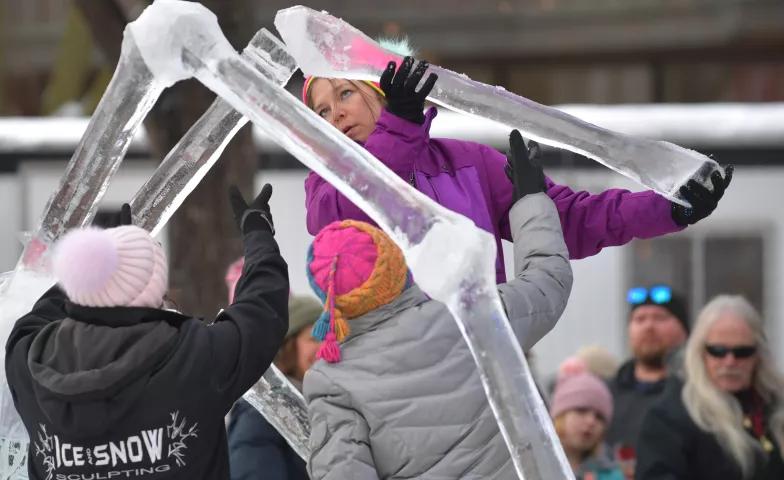 Sarah Butala, from Bloomington checks the fit on a one a leg segment of the ice sculpture “Charlotte Makes A Wish” at Rice Park before the 2020 St. Paul Winter Carnival King Boreas Grand Day Parade in downtown St. Paul on Saturday, Jan. 25, 2020. The all women ice sculpture team joins 4 other teams for the annual Winter Carnival Ice Sculpture contest. (John Autey / Pioneer Press)