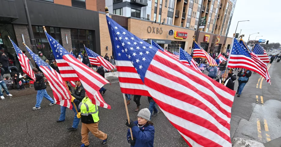 Members of the American Legion 4th district present the colors at the start of the 2020 St. Paul Winter Carnival King Boreas Grand Day Parade in downtown St. Paul on Saturday, Jan. 25, 2020. (John Autey / Pioneer Press)