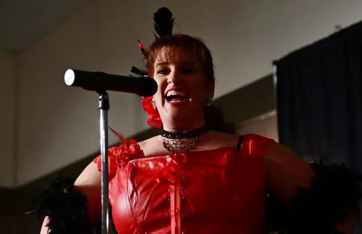 Vonda Bruan, from Cottage Grove, laughs as she flubs a line as she performs in the first round during the Klondike Kate contest at the enVision hotel in South St. Paul on Wednesday, Jan., 8, 2020. (John Autey / Pioneer Press)