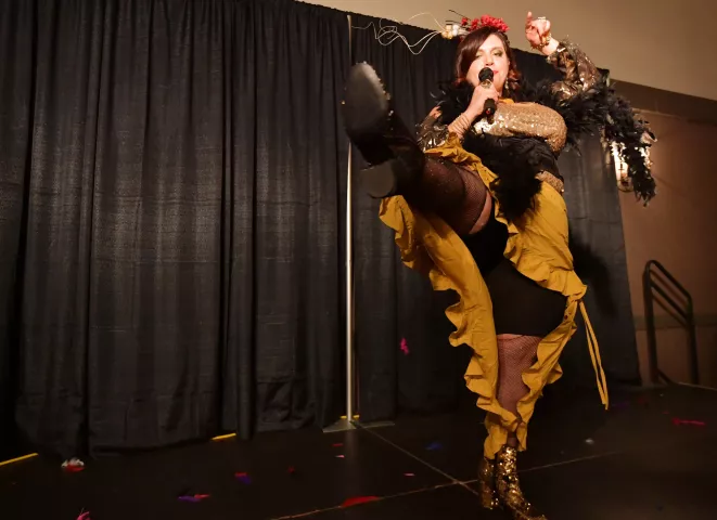 Jennifer Prichard, from St. Paul kicks up her heels during a song in the second round of the Klondike Kate contest at the enVision hotel in South St. Paul on Wednesday, Jan., 8, 2020. (John Autey / Pioneer Press)