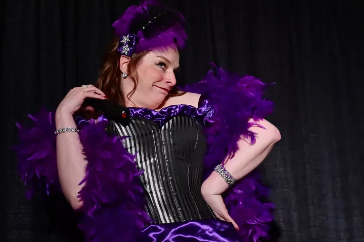 Shelley Pabst, from South St. Paul, strikes a pose in the second round of the Klondike Kate contest Jan. 8, 2020, at the enVision hotel in South St. Paul. Pabst won the contest and was named 2020 Klondike Kate. (John Autey / Pioneer Press)