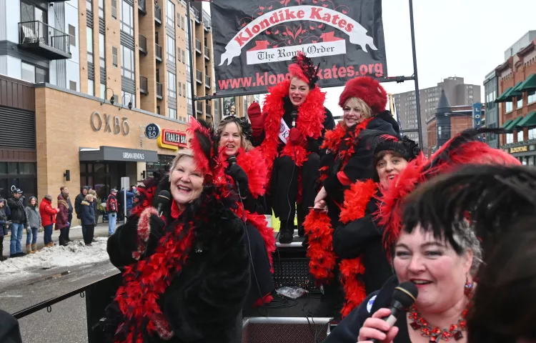 Shelley Pabst, 2020 Klondike Kate, rear top, joins past Kates in entertaining the crowds during the 2020 St. Paul Winter Carnival King Boreas Grand Day Parade in downtown St. Paul on Saturday, Jan. 25, 2020. (John Autey / Pioneer Press)