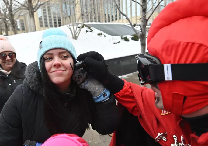 Rheanna Tackaberry, 16, from Orono, gets a “V” complements of a Vulcan during the 2020 St. Paul Winter Carnival King Boreas Grand Day Parade in downtown St. Paul on Saturday, Jan. 25, 2020. (John Autey / Pioneer Press)