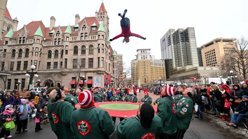 A St. Paul Bouncing Girl does a mid-air backflip during the 2020 St. Paul Winter Carnival King Boreas Grand Day Parade in downtown St. Paul on Saturday, Jan. 25, 2020. (John Autey / Pioneer Press)