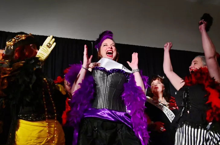 Shelley Pabst, from South St. Paul, reacts as she is sashed as the 2020 Klondike Kate during the Klondike Kate contest at the enVision hotel in South St. Paul on Wednesday, Jan., 8, 2020. Flanking Pabst are the runner ups, Jennifer Prichard, from St. Paul, left, and Tammy McCanna, from St. Louis Park. (John Autey / Pioneer Press)