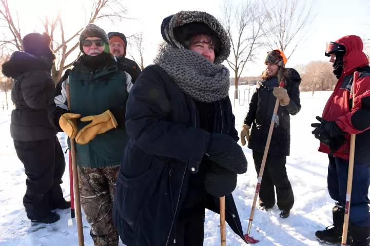 Jana Armstead, center, and other treasure hunter friends talk before heading out to search for the 2019 Pioneer Press Treasure Hunt medallion in Long Lake Regional Park in New Brighton Thursday, Jan. 24, 2019. (Jean Pieri / Pioneer Press)
