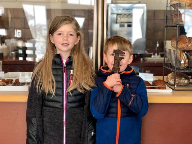 Last year’s winners Nya and Nash Nienhuis with Sheldon’s wrench. This year’s scavenger hunt for the wrench begins Feb. 23. Photo courtesy of Marcel Nienhuis
