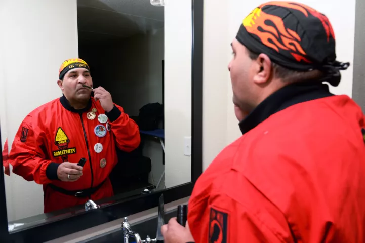 Vulcan Krewe member Gordon Carney, the Grand Duke Fertilious, puts on his makeup in a South St. Paul hotel at the start of the day during the 2020 St. Paul Winter Carnival, Wednesday, Jan. 29, 2020. (Scott Takushi / Pioneer Press)