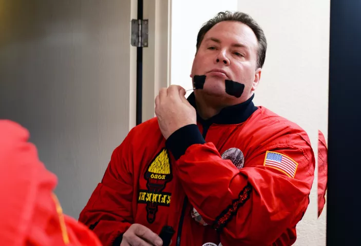 Vulcan Krewe member Michael Kickbush, the Duke of Klinker, puts on his makeup in a South St. Paul hotel at the start of the day during the 2020 St. Paul Winter Carnival, Wednesday, Jan. 29, 2020. (Scott Takushi / Pioneer Press)