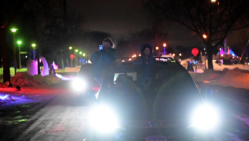 Ellia and Errol Caines of St. Anthony take in the sights at the St. Paul Winter Carnival Drive-Thru Ice and Snow Sculpture Park on the Minnesota State Fairgrounds in Falcon Heights on Thursday, Jan. 28, 2021. (John Autey / Pioneer Press)